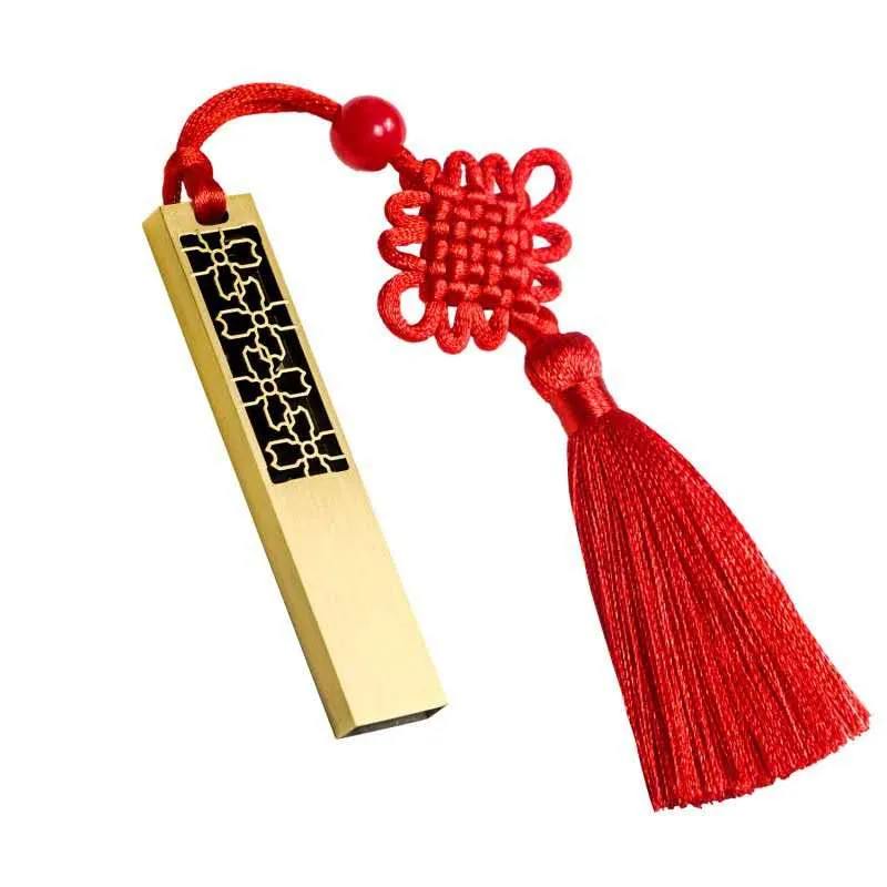 Gold USB drive with red tassel