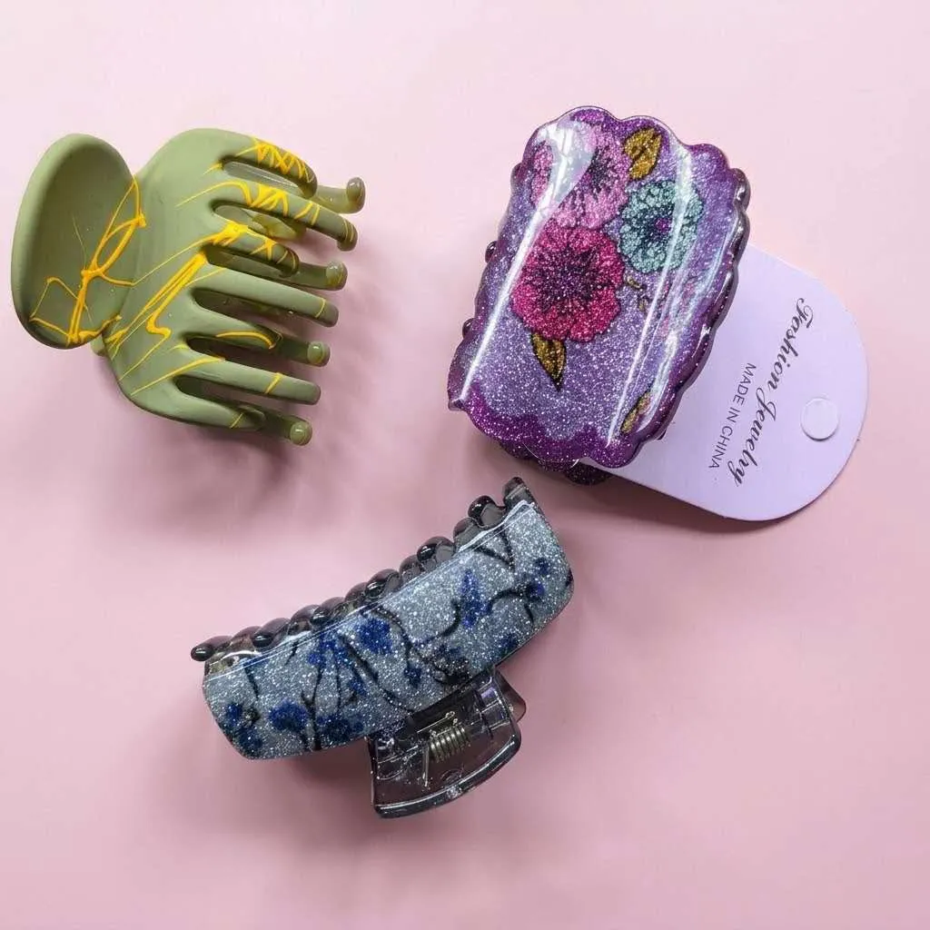 Stylish glitter hair catchers set flat lay